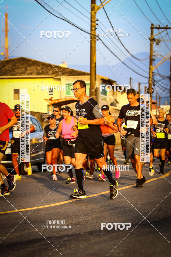 Buy your photos of the eventguia 13K Praia Grande on Fotop