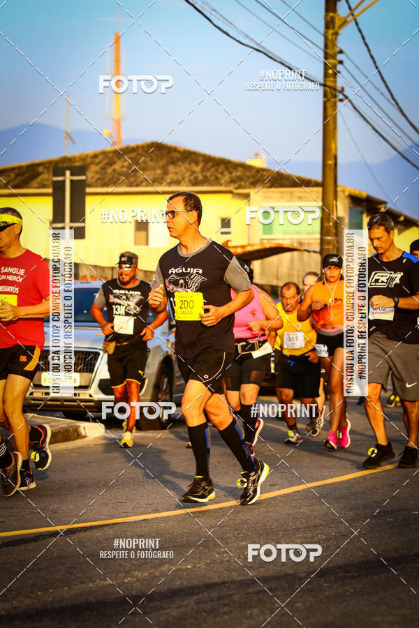 Buy your photos of the eventguia 13K Praia Grande on Fotop