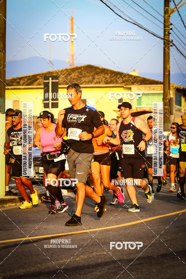 Buy your photos of the eventguia 13K Praia Grande on Fotop