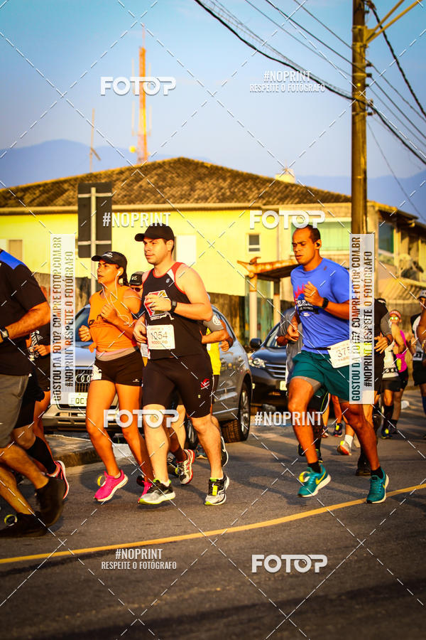Buy your photos of the eventguia 13K Praia Grande on Fotop