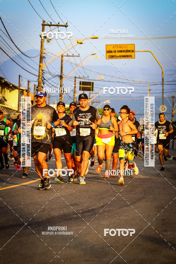 Buy your photos of the eventguia 13K Praia Grande on Fotop