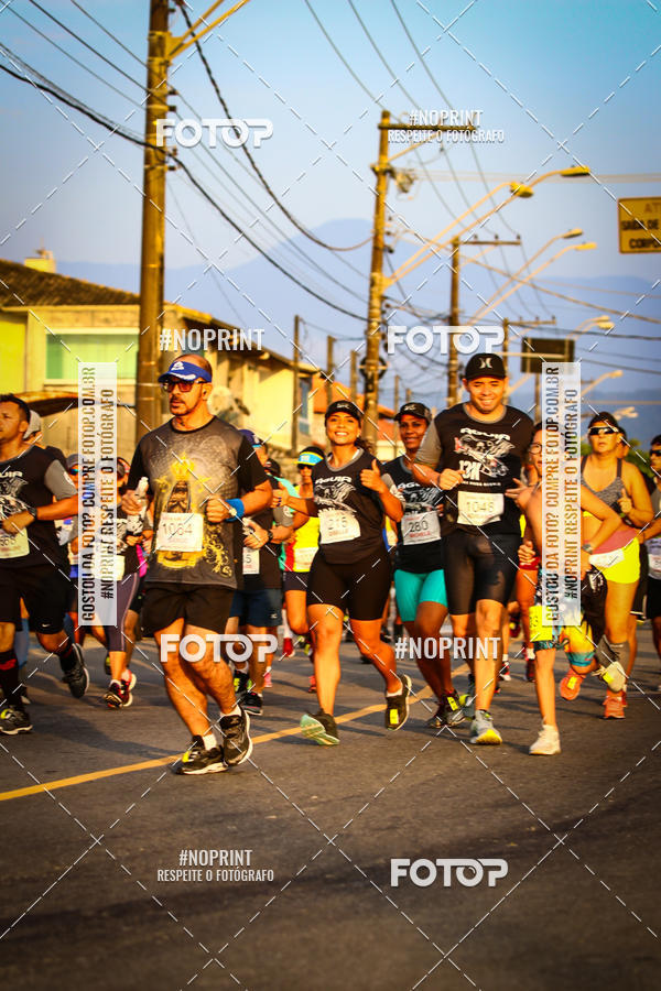 Buy your photos of the eventguia 13K Praia Grande on Fotop