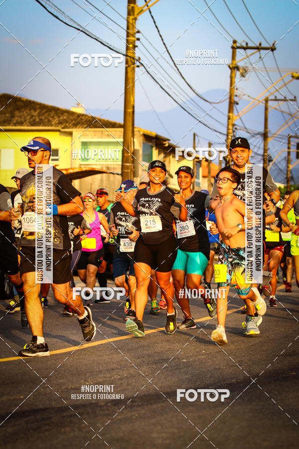 Buy your photos of the eventguia 13K Praia Grande on Fotop