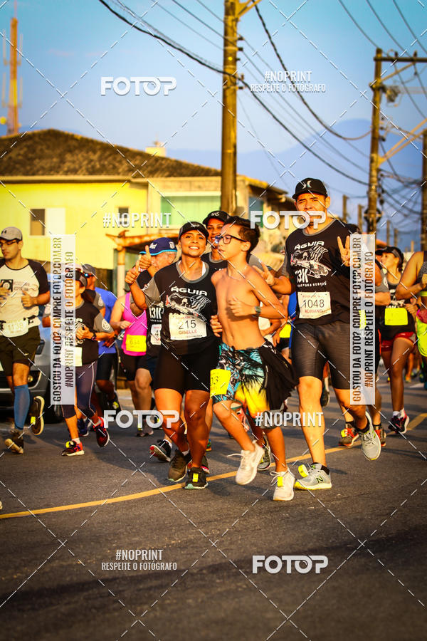 Buy your photos of the eventguia 13K Praia Grande on Fotop