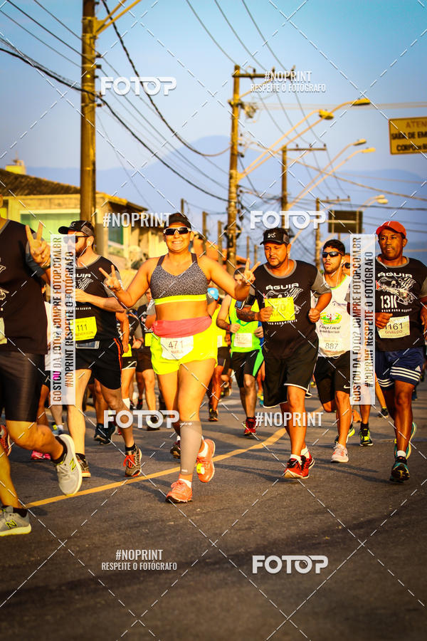 Buy your photos of the eventguia 13K Praia Grande on Fotop