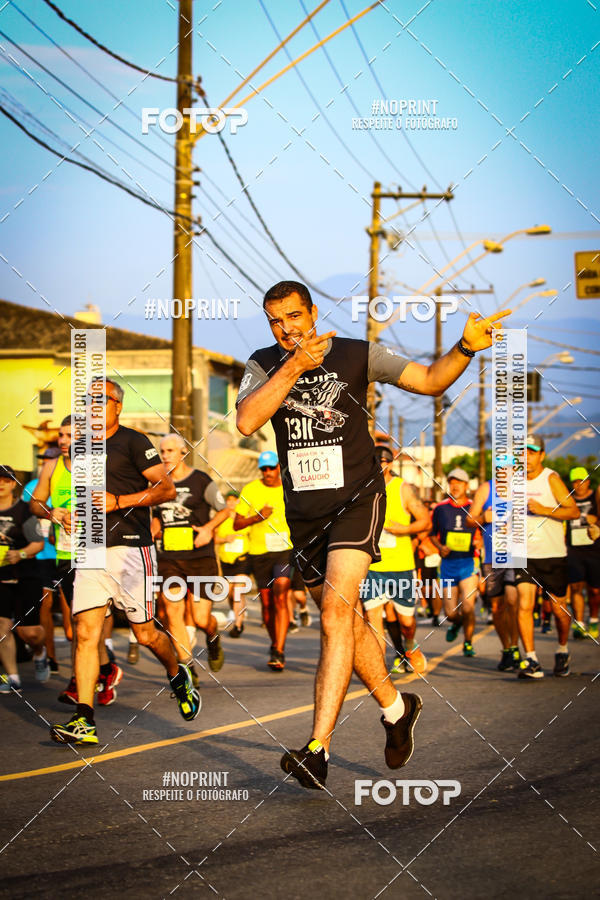 Buy your photos of the eventguia 13K Praia Grande on Fotop