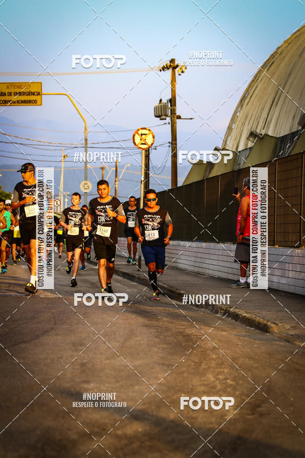 Buy your photos of the eventguia 13K Praia Grande on Fotop
