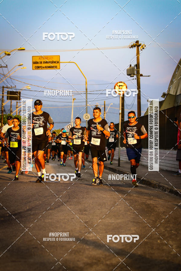 Buy your photos of the eventguia 13K Praia Grande on Fotop