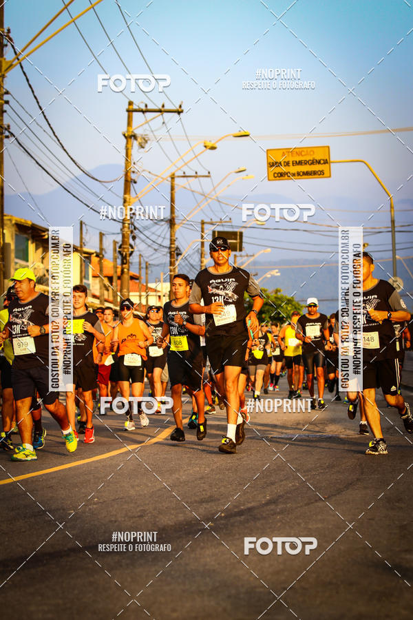Buy your photos of the eventguia 13K Praia Grande on Fotop