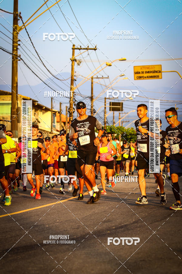 Buy your photos of the eventguia 13K Praia Grande on Fotop