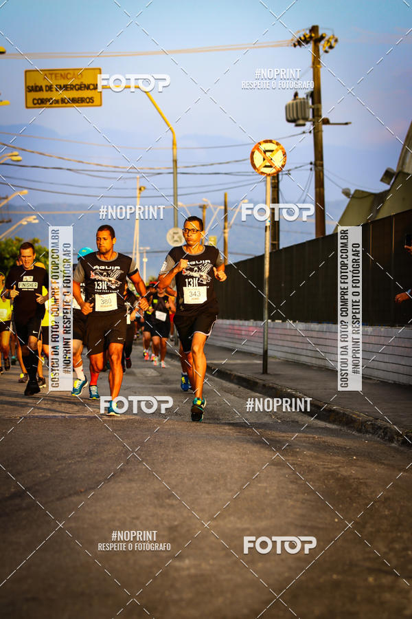Buy your photos of the eventguia 13K Praia Grande on Fotop