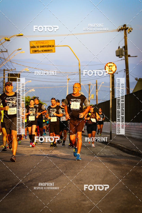 Buy your photos of the eventguia 13K Praia Grande on Fotop