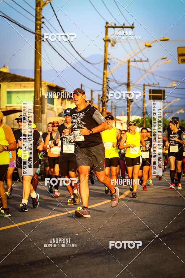 Buy your photos of the eventguia 13K Praia Grande on Fotop