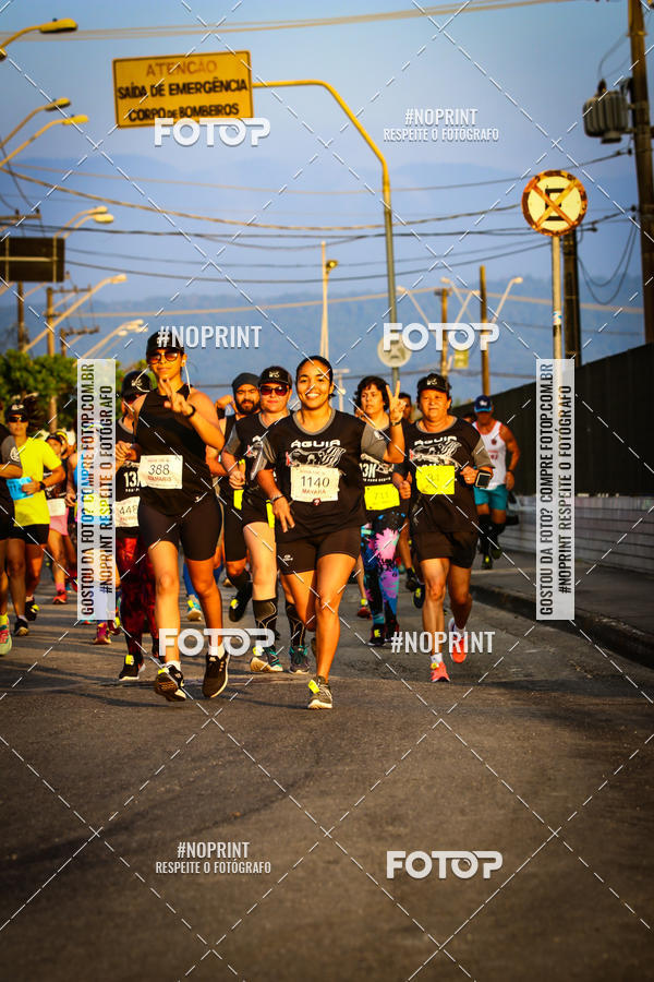 Buy your photos of the eventguia 13K Praia Grande on Fotop