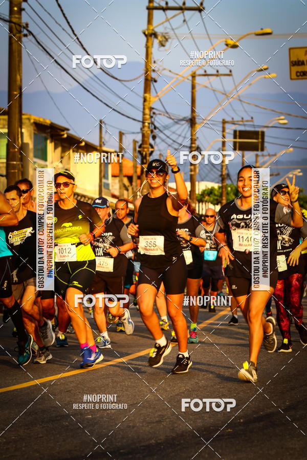Buy your photos of the eventguia 13K Praia Grande on Fotop