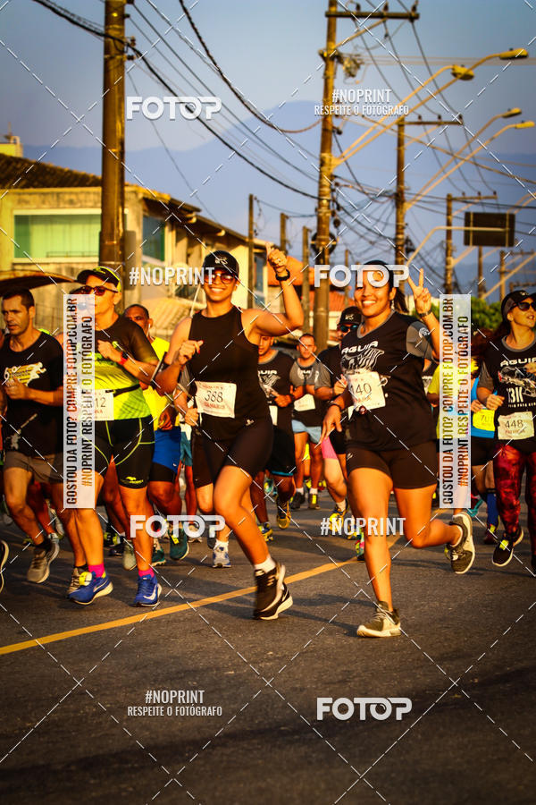Buy your photos of the eventguia 13K Praia Grande on Fotop