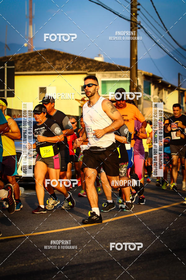 Buy your photos of the eventguia 13K Praia Grande on Fotop