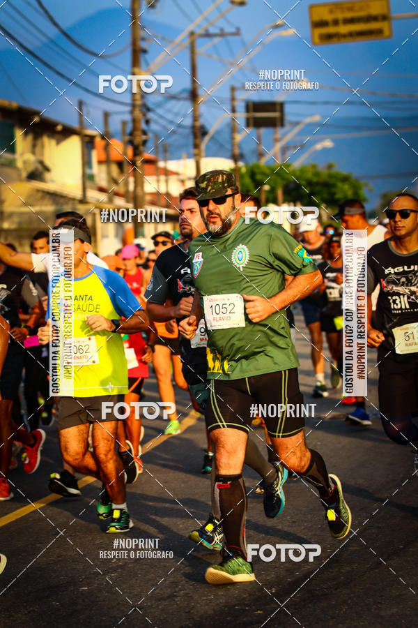 Buy your photos of the eventguia 13K Praia Grande on Fotop