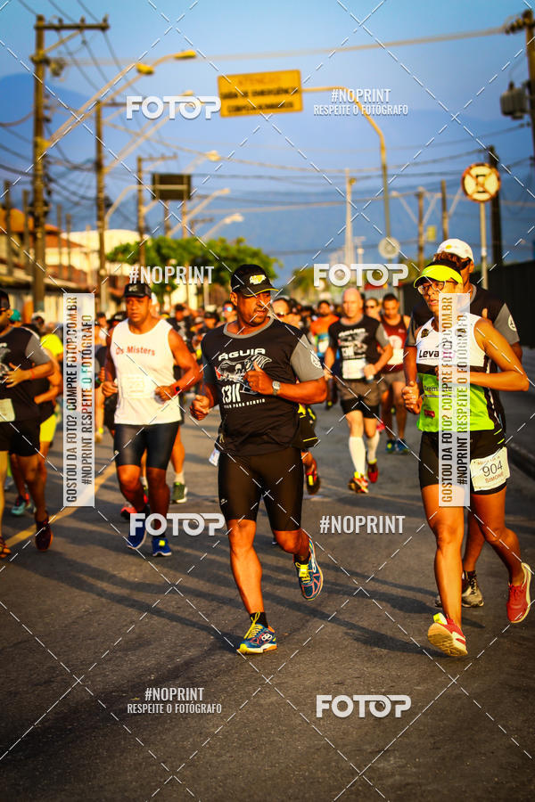 Buy your photos of the eventguia 13K Praia Grande on Fotop