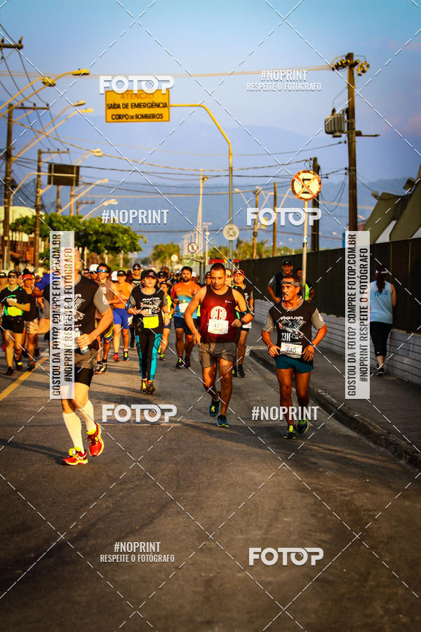 Buy your photos of the eventguia 13K Praia Grande on Fotop