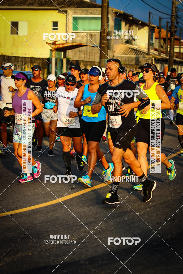 Buy your photos of the eventguia 13K Praia Grande on Fotop