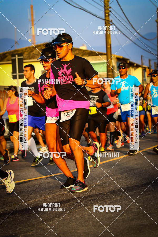 Buy your photos of the eventguia 13K Praia Grande on Fotop