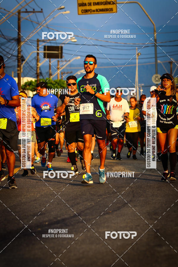 Buy your photos of the eventguia 13K Praia Grande on Fotop