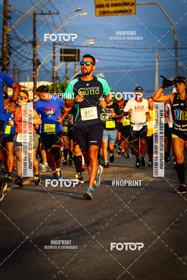 Buy your photos of the eventguia 13K Praia Grande on Fotop