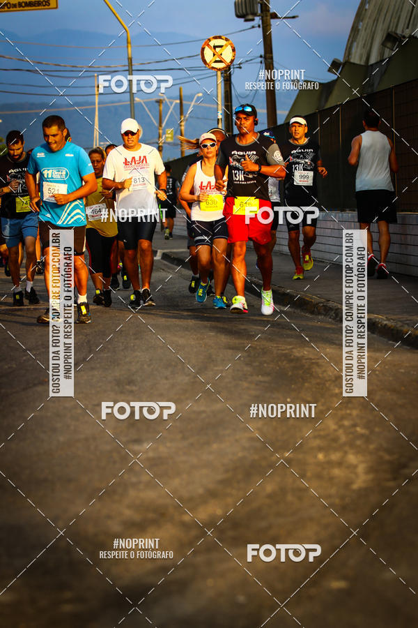 Buy your photos of the eventguia 13K Praia Grande on Fotop