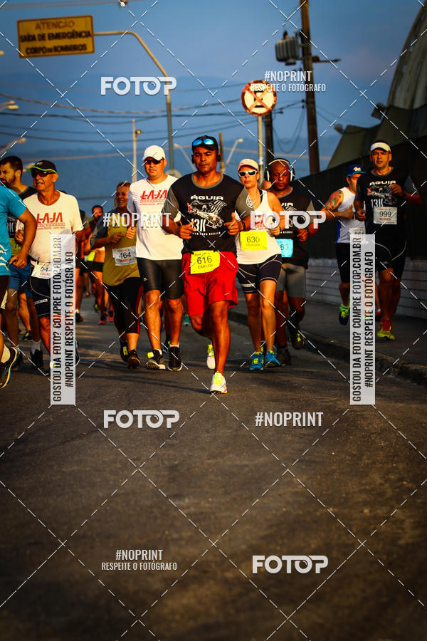 Buy your photos of the eventguia 13K Praia Grande on Fotop