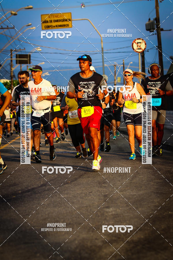 Buy your photos of the eventguia 13K Praia Grande on Fotop