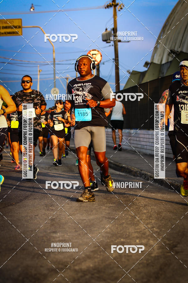 Buy your photos of the eventguia 13K Praia Grande on Fotop
