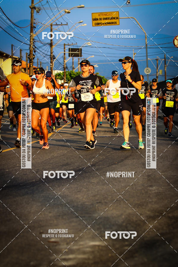 Buy your photos of the eventguia 13K Praia Grande on Fotop