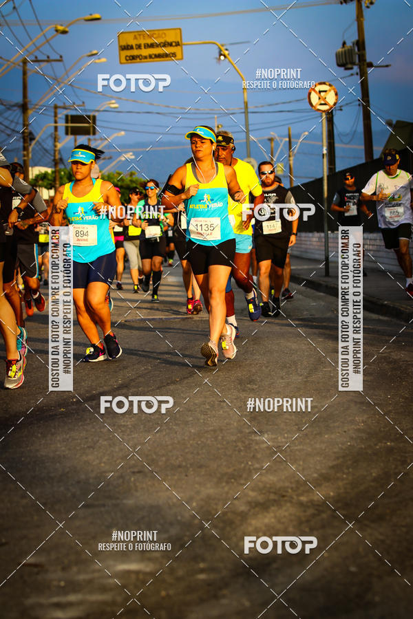 Buy your photos of the eventguia 13K Praia Grande on Fotop