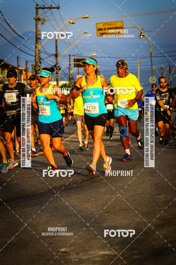 Buy your photos of the eventguia 13K Praia Grande on Fotop