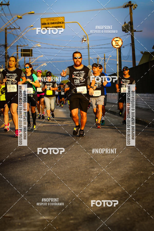 Buy your photos of the eventguia 13K Praia Grande on Fotop