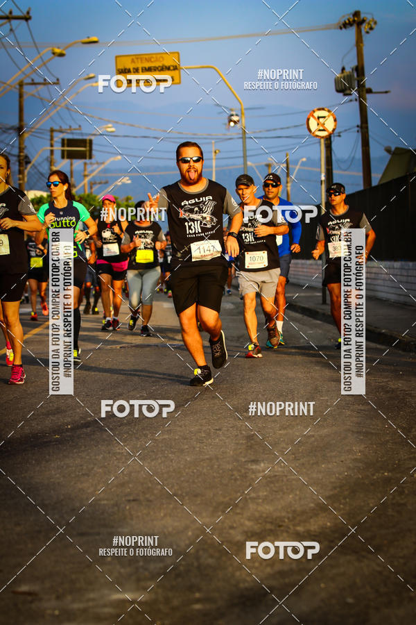 Buy your photos of the eventguia 13K Praia Grande on Fotop
