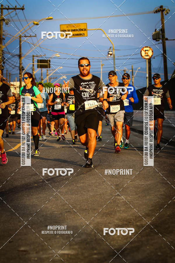 Buy your photos of the eventguia 13K Praia Grande on Fotop