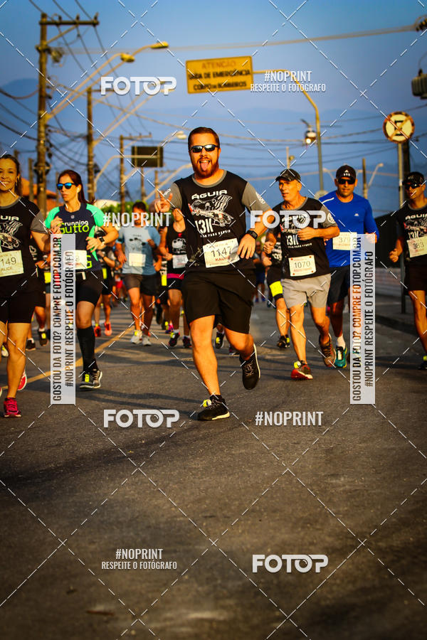 Buy your photos of the eventguia 13K Praia Grande on Fotop