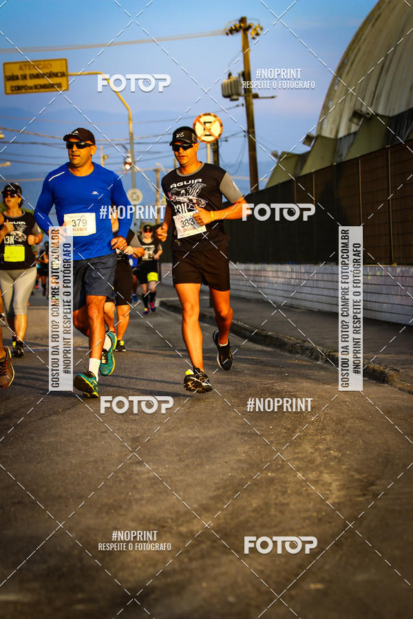 Buy your photos of the eventguia 13K Praia Grande on Fotop
