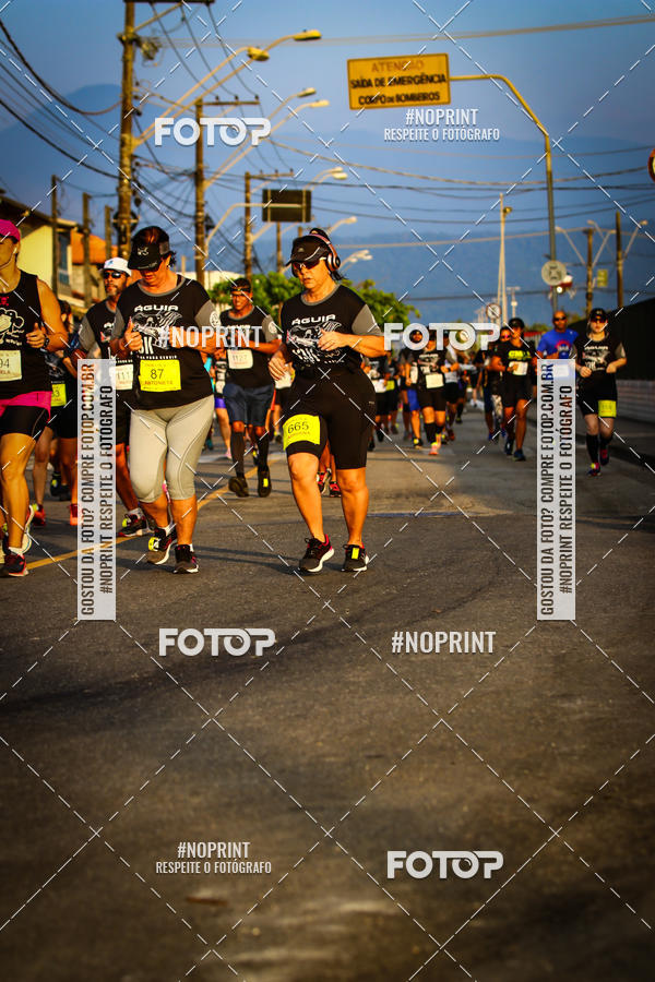 Buy your photos of the eventguia 13K Praia Grande on Fotop