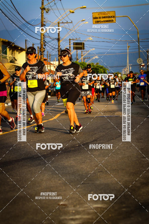 Buy your photos of the eventguia 13K Praia Grande on Fotop