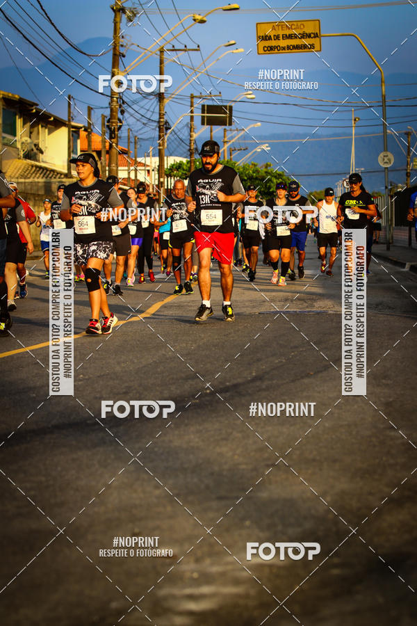 Buy your photos of the eventguia 13K Praia Grande on Fotop