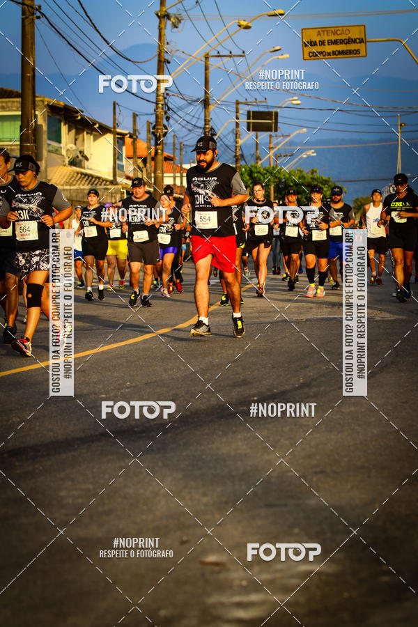 Buy your photos of the eventguia 13K Praia Grande on Fotop
