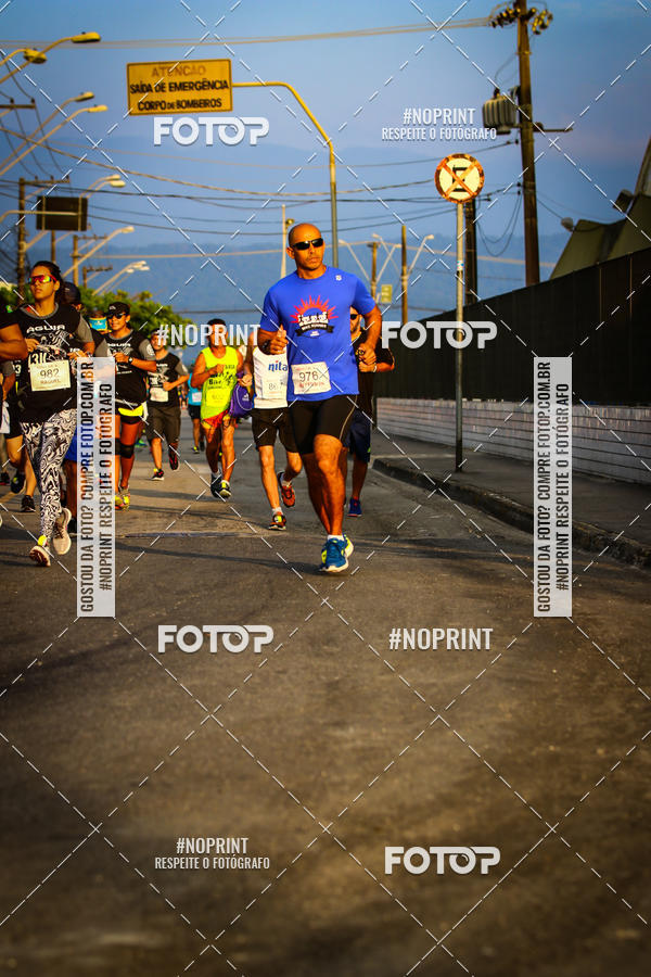 Buy your photos of the eventguia 13K Praia Grande on Fotop