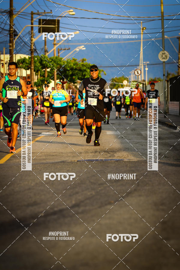 Buy your photos of the eventguia 13K Praia Grande on Fotop