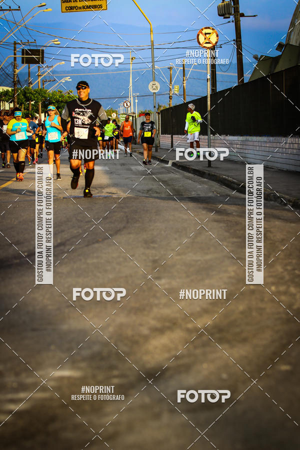 Buy your photos of the eventguia 13K Praia Grande on Fotop
