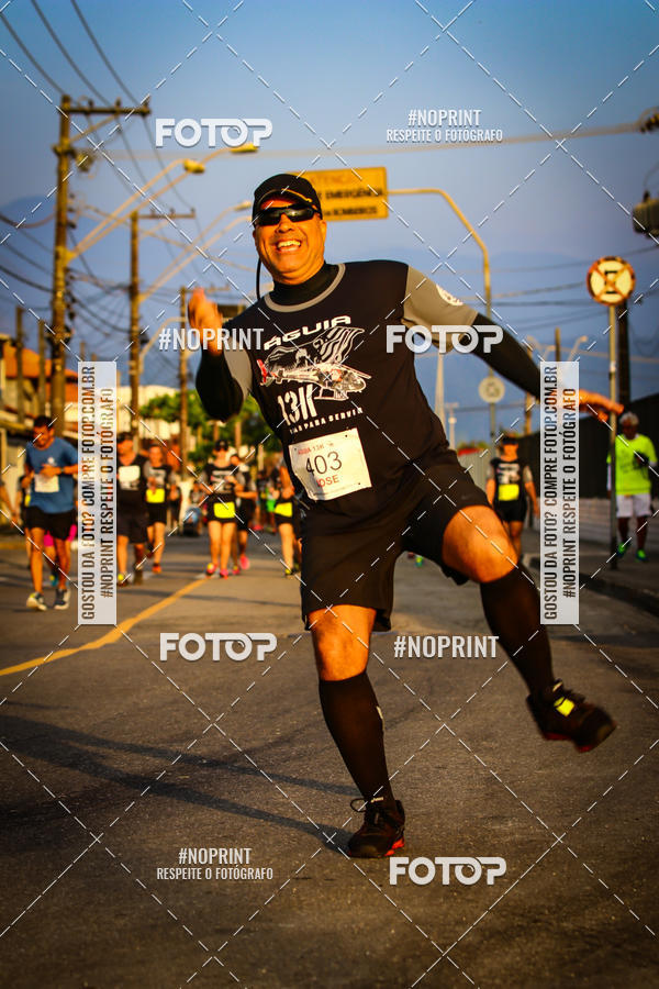Buy your photos of the eventguia 13K Praia Grande on Fotop