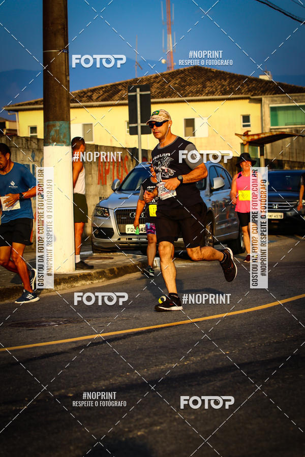 Buy your photos of the eventguia 13K Praia Grande on Fotop