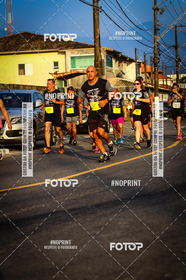 Buy your photos of the eventguia 13K Praia Grande on Fotop